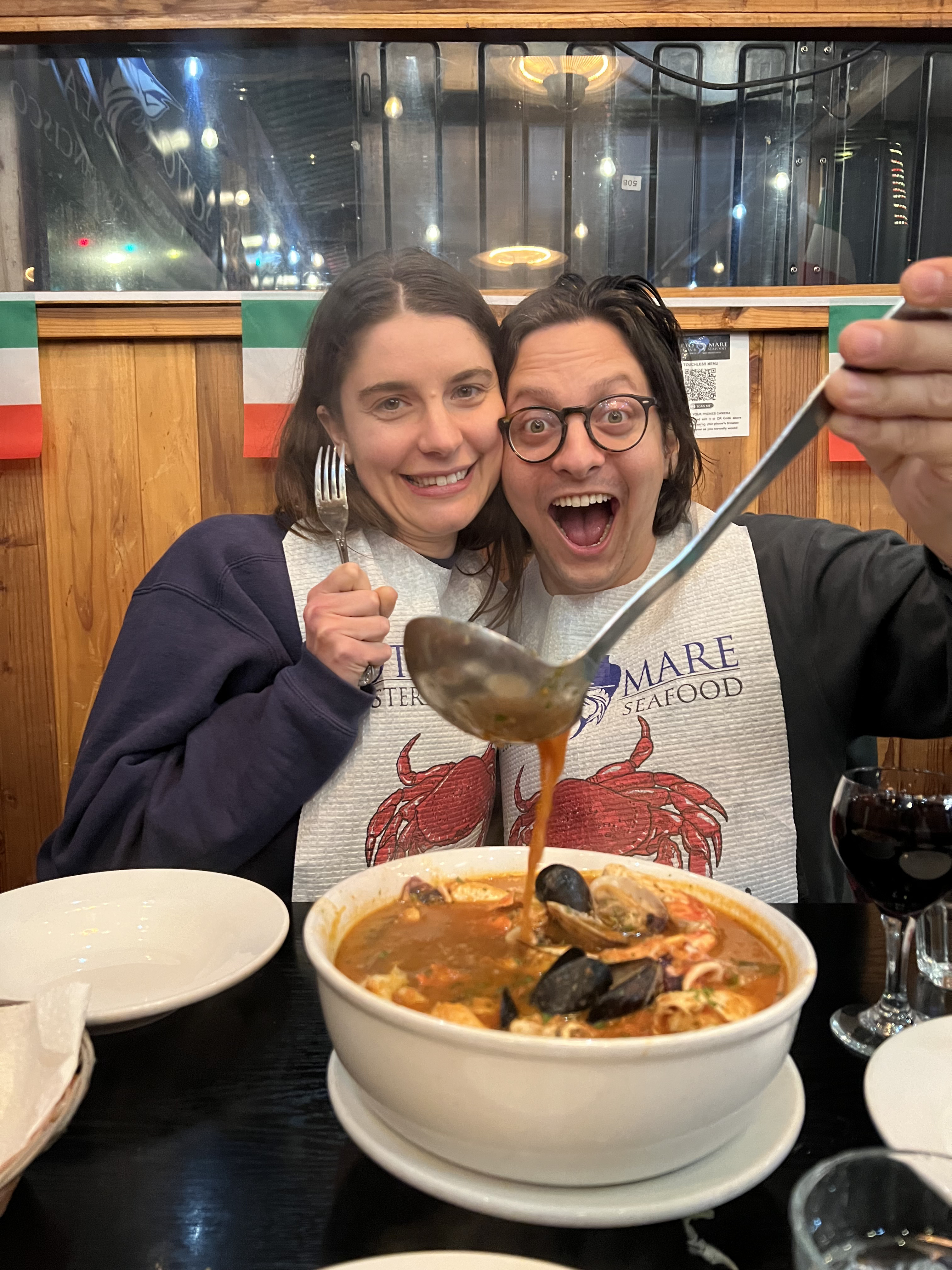 Picture of Maggie and Brian hugging, overlooking a city